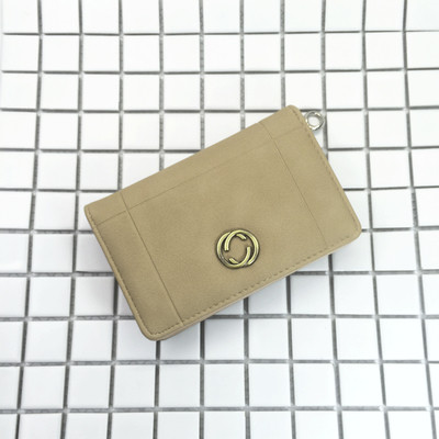 Красиво дамско портмоне в шест цвята с малка метална декорация