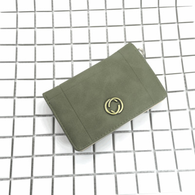 Красиво дамско портмоне в шест цвята с малка метална декорация