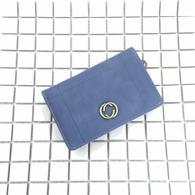 Красиво дамско портмоне в шест цвята с малка метална декорация