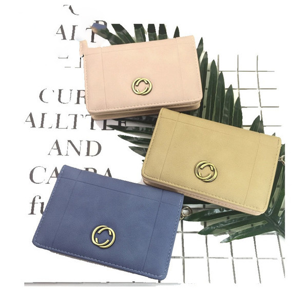 Красиво дамско портмоне в шест цвята с малка метална декорация