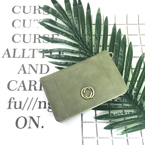 Красиво дамско портмоне в шест цвята с малка метална декорация