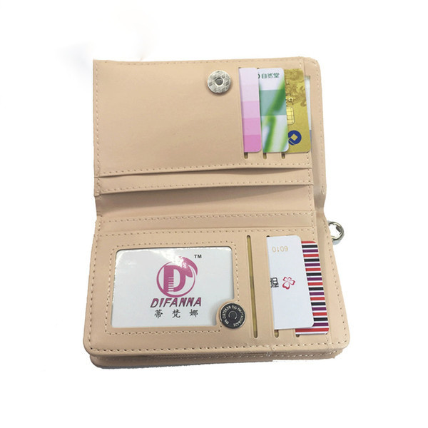 Красиво дамско портмоне в шест цвята с малка метална декорация