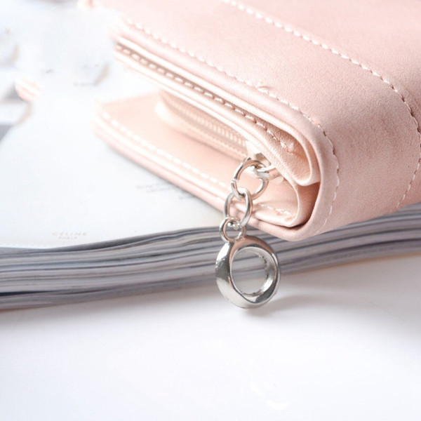 Красив дамски портфейл в шест цвята с малка декорация