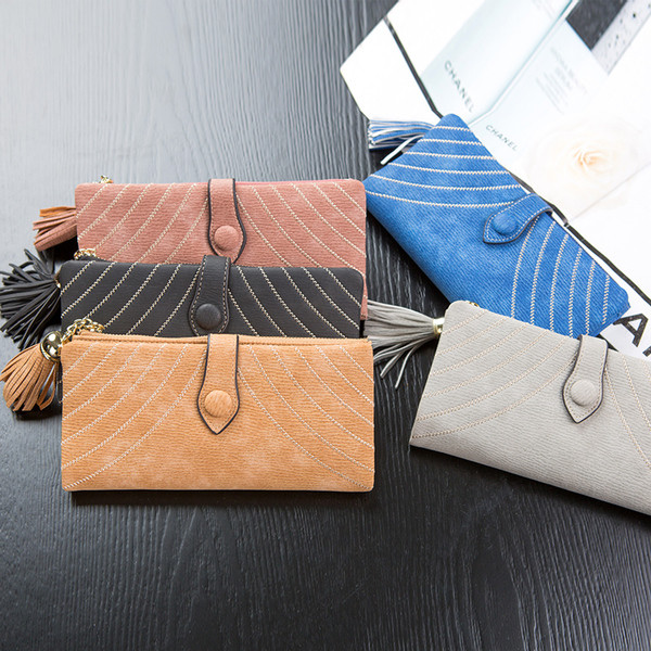 Стилен дамски портфейл с пискюл и копче в пет цвята