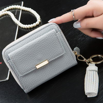 Красив мини дамски портфейл с пискюл в свежи цветове