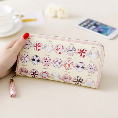 Дамски портфейл с пискюл и изображения в няколко модела