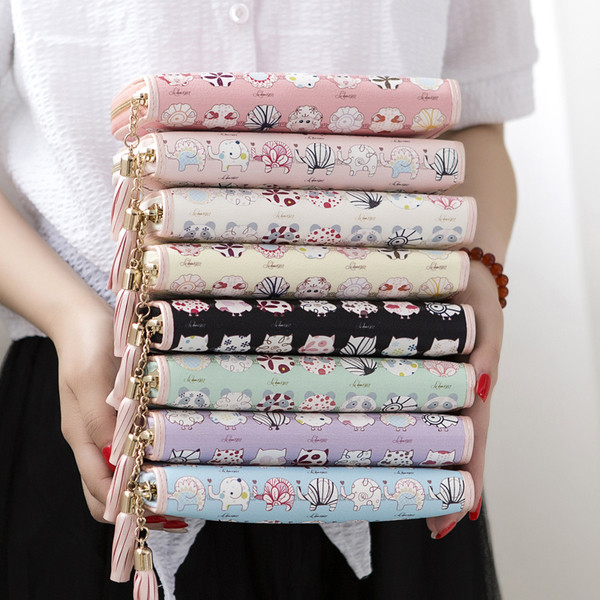 Дамски портфейл с пискюл и изображения в няколко модела