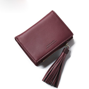 Мини дамски портфейл с пискюл в семпъл модел в шест цвята