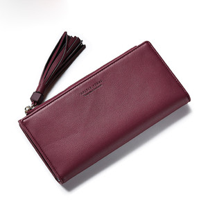 Красив дамски портфейл с пискюл в изчистен модел в шест цвята