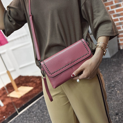 Дамски портфейл-чанта с метална декорация в четири цвята