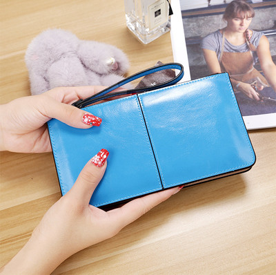 Изчистен дамски портфейл с дръжка в много цветове