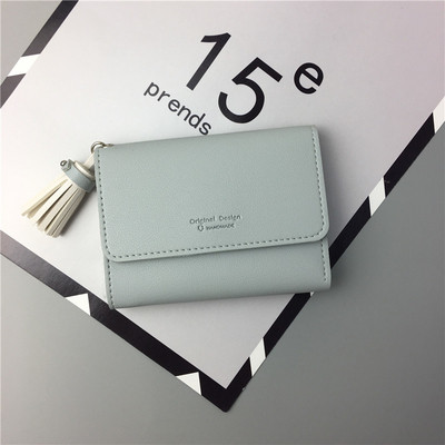 Малък портфейл за дамите с пискюл в четири цвята