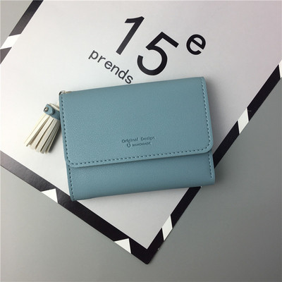 Малък портфейл за дамите с пискюл в четири цвята