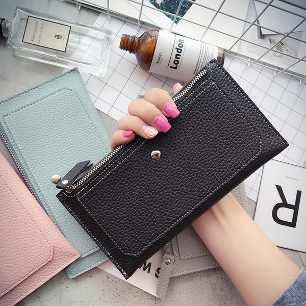 Семпъл портфейл за дамите с копче в четири цвята