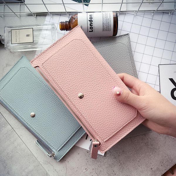 Семпъл портфейл за дамите с копче в четири цвята