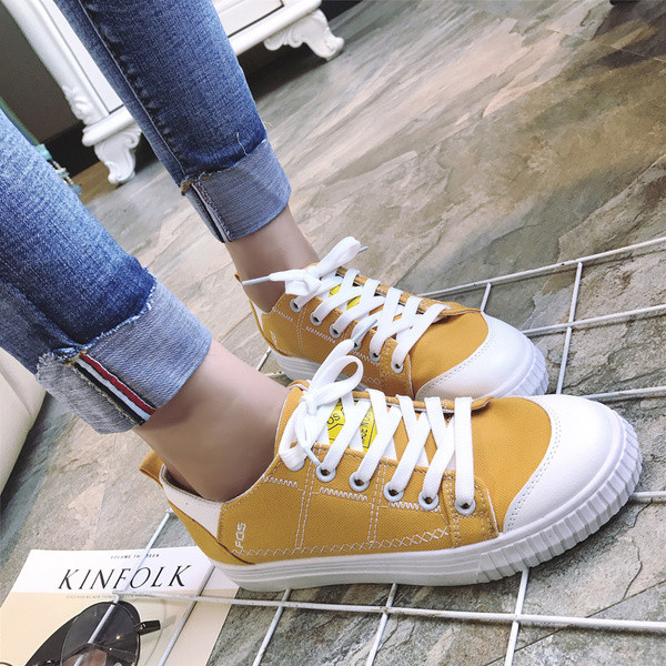 Πανέμορφα γυναικεία πάνινα παπούτσια σε κίτρινο, μαύρο και άσπρο χρώμα