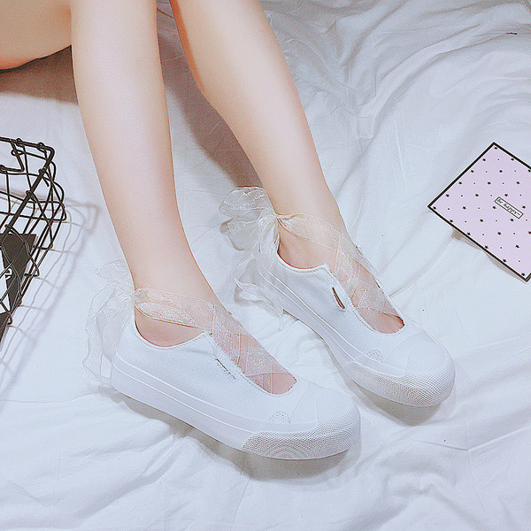 Γλυκά γυναικεία  μοκασίνια με κορδέλα σε μαύρο και άσπρο