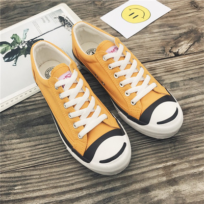 Κομψά ανδρικά πάνινα παπούτσια σε μαύρο, λευκό και κίτρινο χρώμα