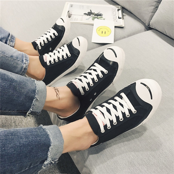 Κομψά ανδρικά πάνινα παπούτσια σε μαύρο, λευκό και κίτρινο χρώμα