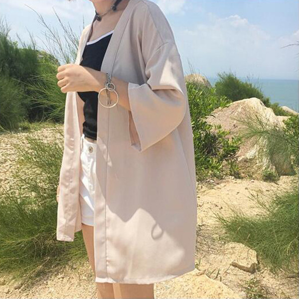 Κομψή γυναικεία ζακέτα  με 3/4 μανίκια, σε ευρύ σχέδιο και σε δύο χρώματα