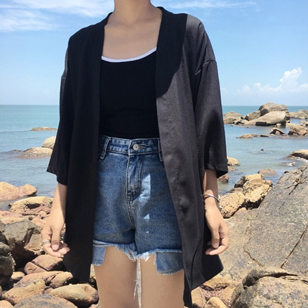 Κομψή γυναικεία ζακέτα  με 3/4 μανίκια, σε ευρύ σχέδιο και σε δύο χρώματα