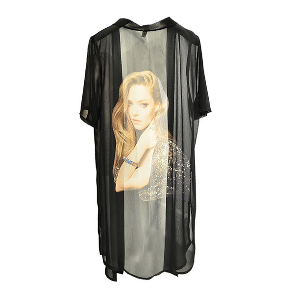 Κομψή μακρύ γυναικεία ζακέτα  σε λευκό και μαύρο χρώμα