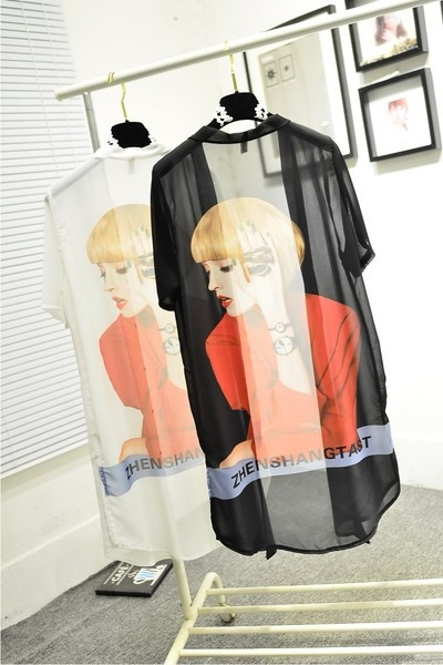 Γυναικεία  μακρύ ζακέτα σε λευκό και μαύρο χρώμα