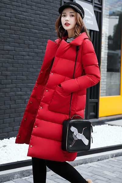 Стилно дамско зимно яке в изчистен и дълъг модел с пълнеж от гъши пух