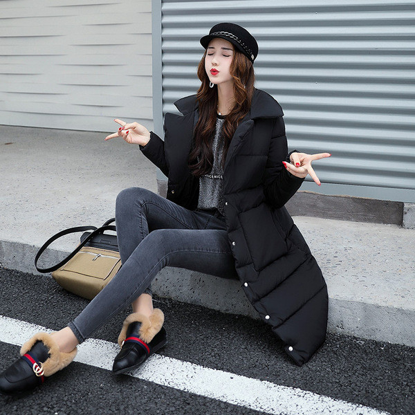 Стилно дамско зимно яке в изчистен и дълъг модел с пълнеж от гъши пух