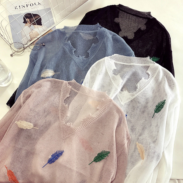 Λεπτό και διάτρηση  γυναικείο πουλόβερ  σε τέσσερα χρώματα με κεντήματα