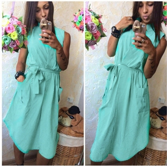 Свежа дамска рокля с джобове в широк модел и с колан