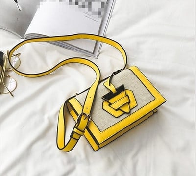 Σύγχρονη γυναικεία  τσάντα με ενδιαφέρουσα και πολύ πρωτότυπη στερέωση