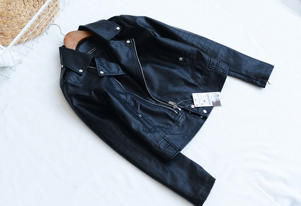 Δερμάτινο μπουφάν σε κίτρινο, μαύρο και άσπρο