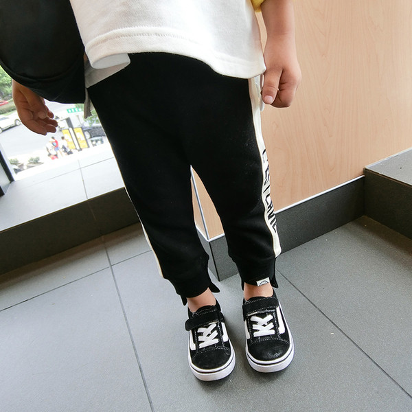 Детски панталони за момичета в черен и сив цвят с надпис