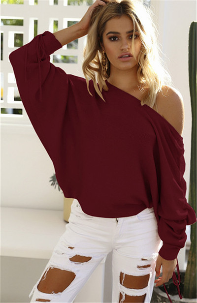 Γυναικεία κομψή καθημερινή μπλούζα με πτώση ώμου και ένα ενδιαφέρον μανίκι με κορδόνια