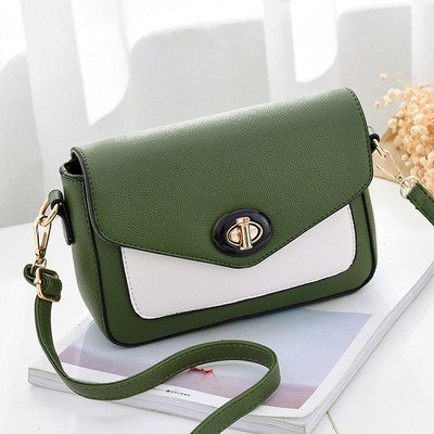 Κομψό γυναικείο μίνι σακίδιο με μακρύ ιμάντα ώμου και ενδιαφέρουσα πόρπη για στερέωση