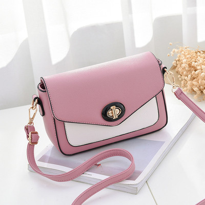 Κομψό γυναικείο μίνι σακίδιο με μακρύ ιμάντα ώμου και ενδιαφέρουσα πόρπη για στερέωση