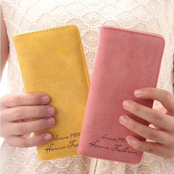 Κομψό και πολύ πρακτικό γυναικείο πορτοφόλι