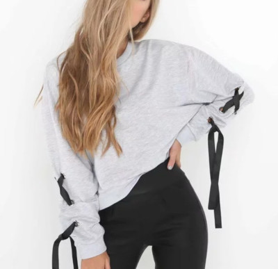 Γυναικεία καθημερινή αθλητική μπλούζα με κοντά μανίκια και πολλά ενδιαφέροντα κορδόνια