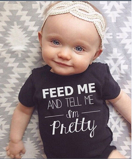 Παιδικό ολόσωμο σε λευκό και μαύρο χρώμα με επιγραφή