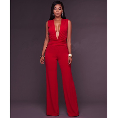 Γυναικείο ολόσωμο με βαθύ λαιμόκοψη και πολύ πρόσφατα παντελόνια με φαρδιά πόδια