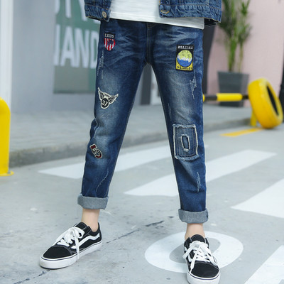 Κομψά παιδικά τζιν για αγόρια - ραγισμένα και με εφαρμογές