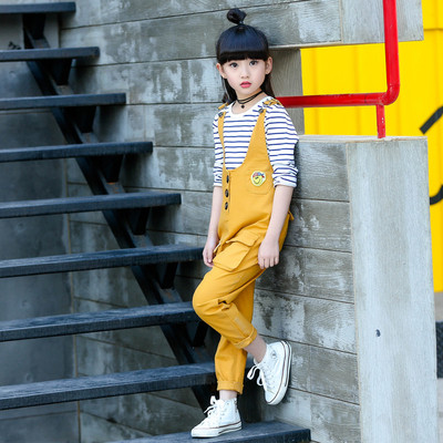 Κομψό παιδικό ολόσωμο για κορίτσια σε τρία χρώματα, τσέπες και εκτύπωση