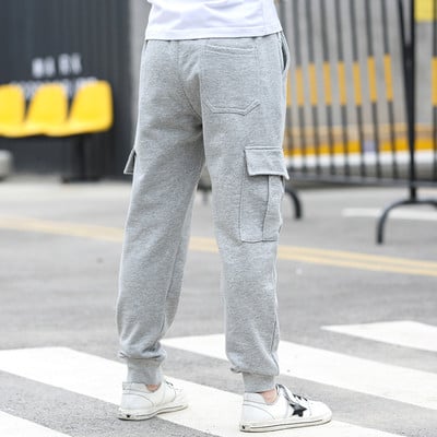 Αθλητικά παντελόνια για αγόρια με τσέπες σε μαύρο και γκρι