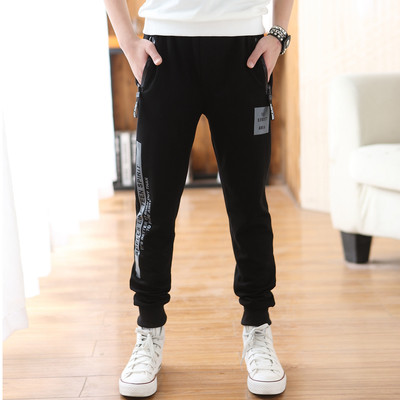 Αθλητικά παιδικά παντελόνια για αγόρια σε μαύρο και γκρι