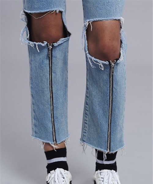 Γυναικεία τζιν  με υψηλή μέση, σχισμένα και με  φερμουάρ