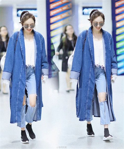 Γυναικεία τζιν  με υψηλή μέση, σχισμένα και με  φερμουάρ