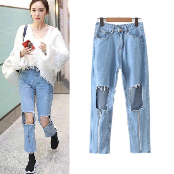 Γυναικεία τζιν  με υψηλή μέση, σχισμένα και με  φερμουάρ