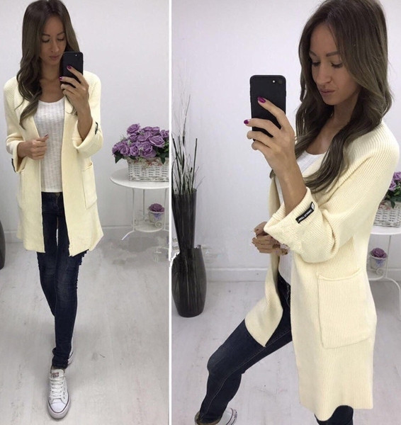 Καθημερινή γυναικεία ζακέτα  με φαρδιά μανίκια και τσέπες 