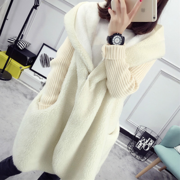 Ζεστή και μακρύ χειμωνιάτική ζακέτα με πλεκτά μανίκια σε διάφορα χρώματα